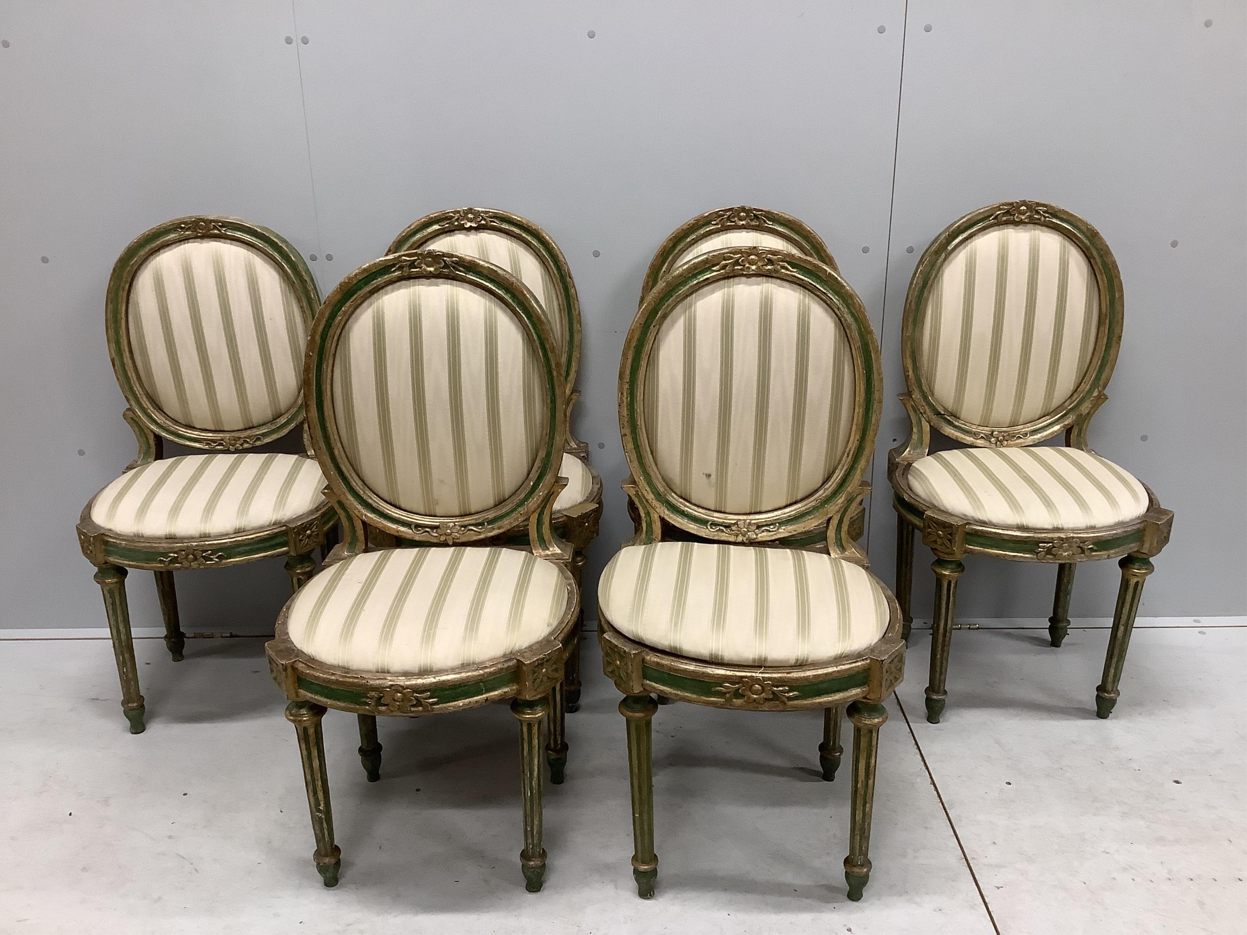 A set of six early 19th century Venetian painted, silvered parcel gilt side chairs, width 44cm, depth 40cm, height 99cm. Condition - fair to good
